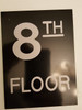 Sign 8TH FLOOR