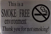 THIS IS A SMOKE FREE ENVIRONMENT THANK YOU FOR NOT SMOKING SIGN