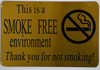 THIS IS A SMOKE FREE ENVIRONMENT THANK YOU FOR NOT SMOKING SIGN