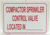 COMPACTOR SPRINKLER CONTROL VALVE LOCATED IN_ SIGN