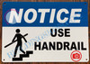 NOTICE USE HANDRAIL SIGN