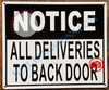 NOTICE ALL DELIVERIES TO BACK DOOR SIGN