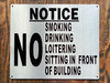 NO SMOKING DRINKING LOITERING SITTING IN FRONT OF BUILDING SIGN