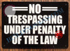 Signage NO TRESPASSING Under Penalty of The Law
