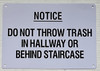 NOTICE: DO NOT THROW TRASH IN HALLWAY OR BEHIND STAIRCASE