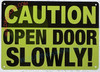 CAUTION: OPEN DOOR SLOWLY Signage