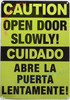 CAUTION: OPEN DOOR SLOWLY ENGLISH/SPANISH SIGN