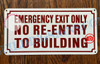 EMERGENCY EXIT ONLY NO RE-ENTRY TO BUILDING SIGN