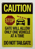 set of TWO  CAUTION STOP GATE WILL ALLOW ONLY ONE VEHICLE AT A TIME DO NOT TAILGATE