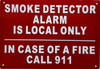 Signage  SMOKE DETECTOR ALARM IS LOCAL ONLY IN CASE OF FIRE CALL 911