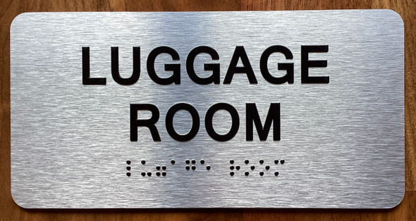 The Luggage Room with Raised Letters & Grade 2 Sign