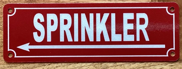SPRINKLER LEFT ARROW SIGN