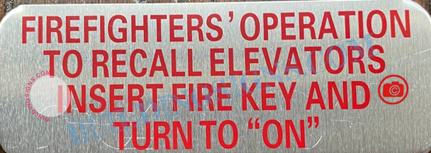 FIREFIGHTERS OPERATION TO RECALL ELEVATORS INSERT FIRE KEY AND TURN TO ON SIGN