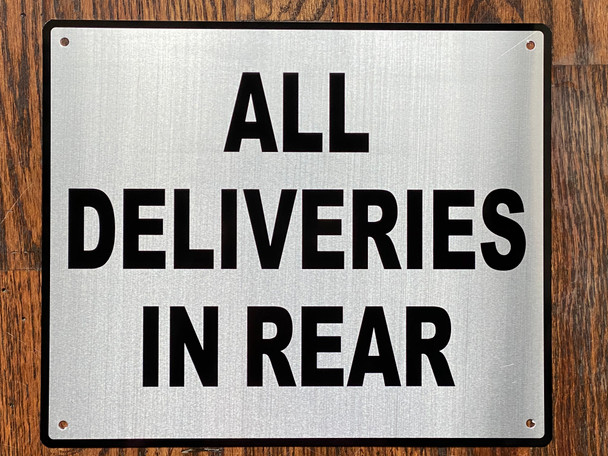 ALL DELIVERIES IN REAR SIGN