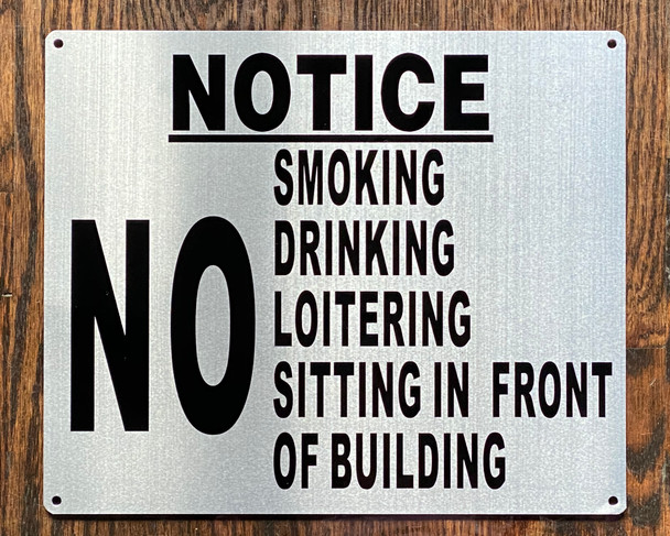 NO SMOKING DRINKING LOITERING SITTING IN FRONT OF BUILDING SIGN