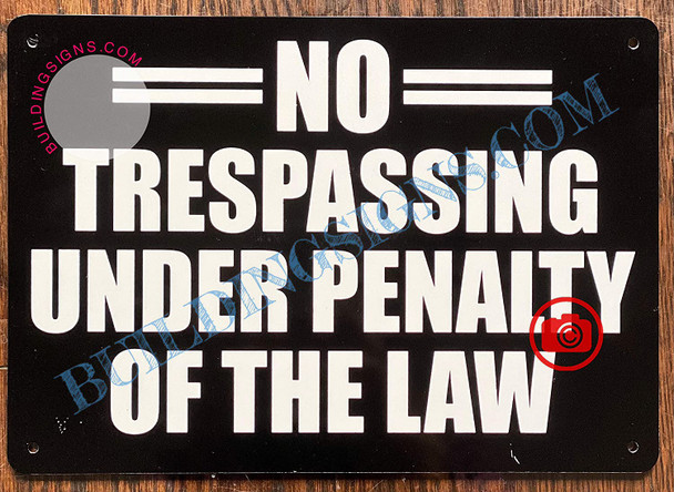 NO TRESPASSING Under Penalty of The Law Signage