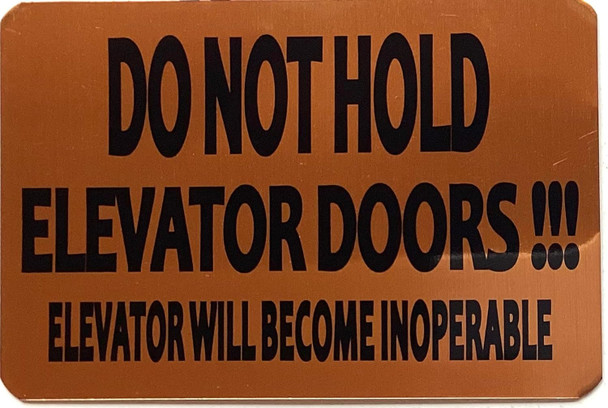 DO NOT HOLD ELEVATOR DOORS ELEVATOR WILL BECOME INOPERABLE  Signage