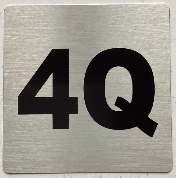 Apartment number 4Q signage