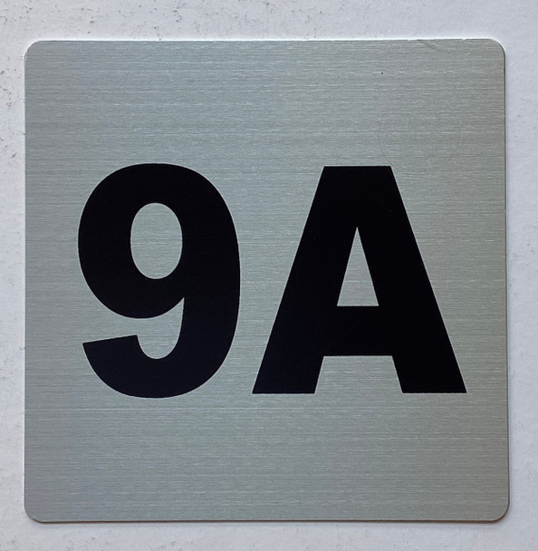 Apartment number 9A sign