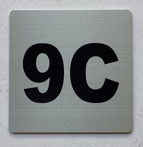 Apartment number 9C sign