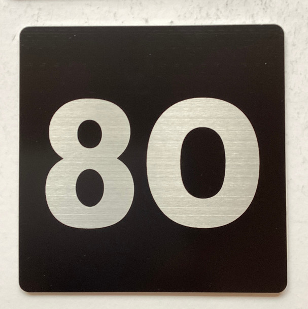 Apartment number 8O signage