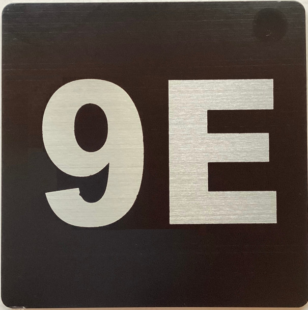 Apartment number 9E signage