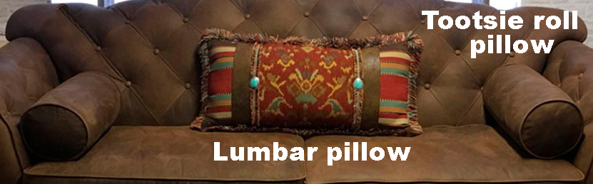 leather-lumbar-and-tootsie-roll-pillows.jpg