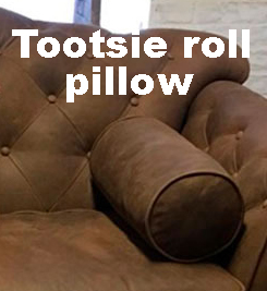 leather-tootsie-roll-pillow-nappy-with-description.jpg