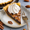Chocolate bourbon pecan tart dessert with whipped cream SendaMeal.com
