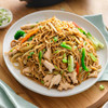Chicken lo mein with stir-fried noodles, tender chicken, broccoli, carrots, peppers, onions, and cabbage. SendaMeal.com
