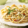 28 oz. – Linguini with Clam Sauce: tender linguini tossed with wild-caught clams in a savory garlic and white wine sauce, finished with butter, cream, fragrant thyme, and bright lemon zest, serves 2-3