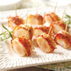Bacon-wrapped scallops on skewers