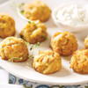 Mini crab cakes arranged for serving