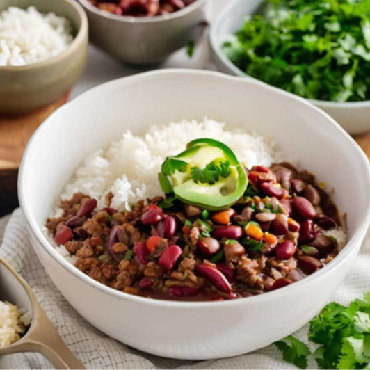 Beef chili with kidney beans and white rice in an individually packaged prepared meal.
