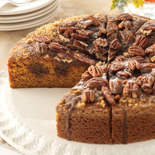 Praline Pumpkin Cake topped with cinnamon streusel and chopped pecans