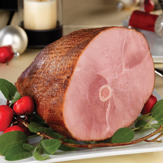 Signature Bone-In Dinner Ham on a serving platter