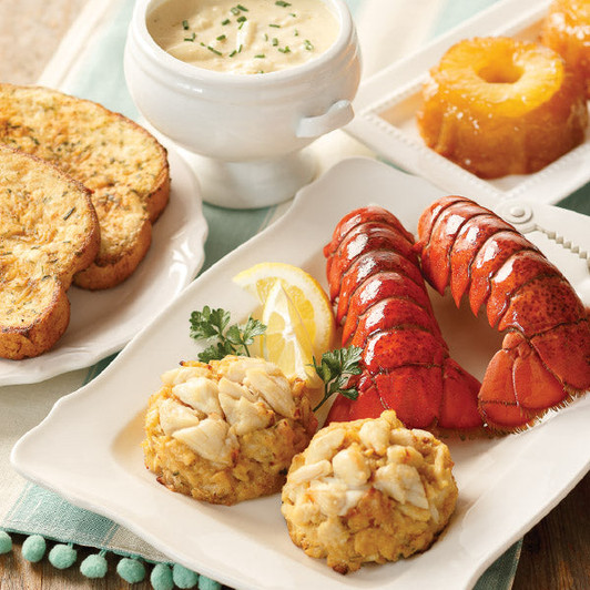 Bounty of the Bay Seafood Sampler with crab soup, crab cakes, lobster tails, crab garlic toast and pineapple cakes