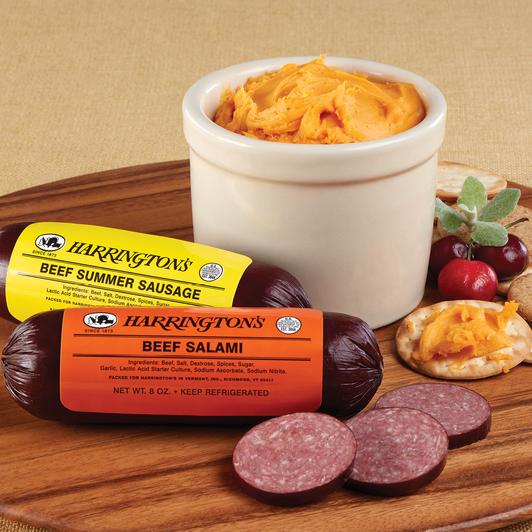 Beef salami and summer sausage; pictured cheese spread and crackers are not included