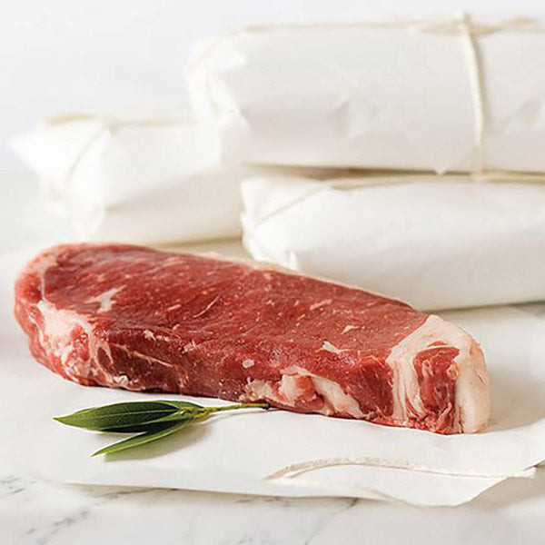 Raw New York strip steak ready for cooking