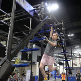 Athete using the Spine v2 with T-Handles