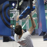 Athlete using Battering Ram to open Door Punch Doors