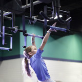 Athlete using Floating Monkey Bars