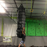 Cargo Net Tube with Foam Cubes in Gym