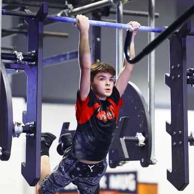Athlete using BarnBuilt Salmon Ladder