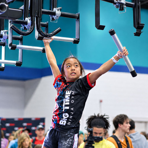 Athlete using Aluminum Pegs with Floating Monkey Bars
