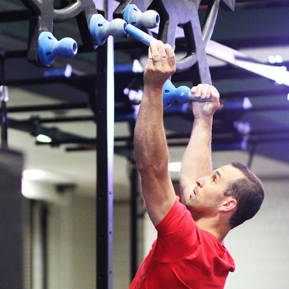 Athlete using Poly Pegs with Peg Graspers