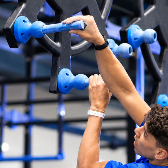 Athlete using Poly Pegs with Peg Graspers
