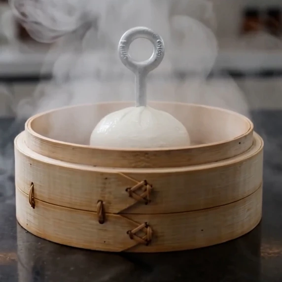 Dumpling in steam basket