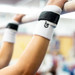 Summit Hook & Loop Uneven Bar Grips in use on bars