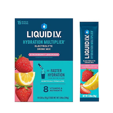 Pouring Strawberry Lemonade Liquid I.V. powder into a glass of water